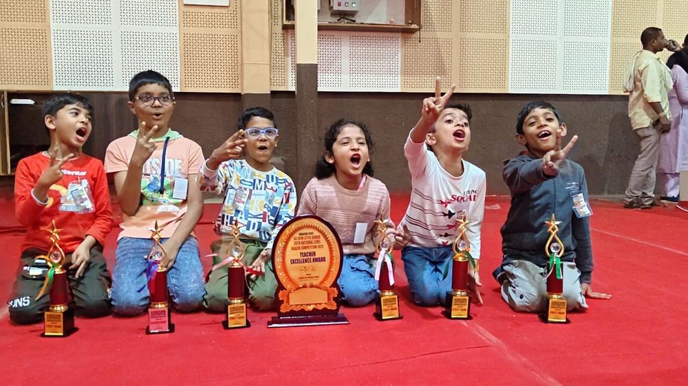 Students celebrating first rank wins at national abacus competition