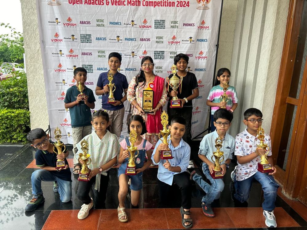 Students with trophies at National Level competition