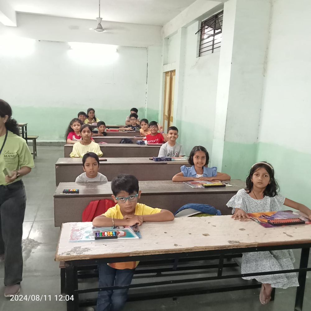 Students seated in classroom with abacus tools